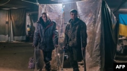 Ранени украински войници в полева болница в бункер на металургичния завод „Азовстал“ в Мариупол, Украйна. Снимката е разпространена на 10 май 2022 г.