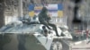 CRIMEA - Russian soldiers blockade Ukrainian military unit A-0669 in Kerch, Crimea, March 13, 2014