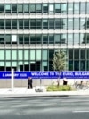 Poster "Bulgaria, welcome to the Euro" is seen in Brussels near the European comission