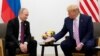 JAPAN -- U.S. President Donald Trump gestures during a bilateral meeting with Russia's President Vladimir Putin at the G20 leaders summit in Osaka, Japan, June 28, 2019.