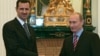 Башар Асад и Владимир Путин през 2015 г.